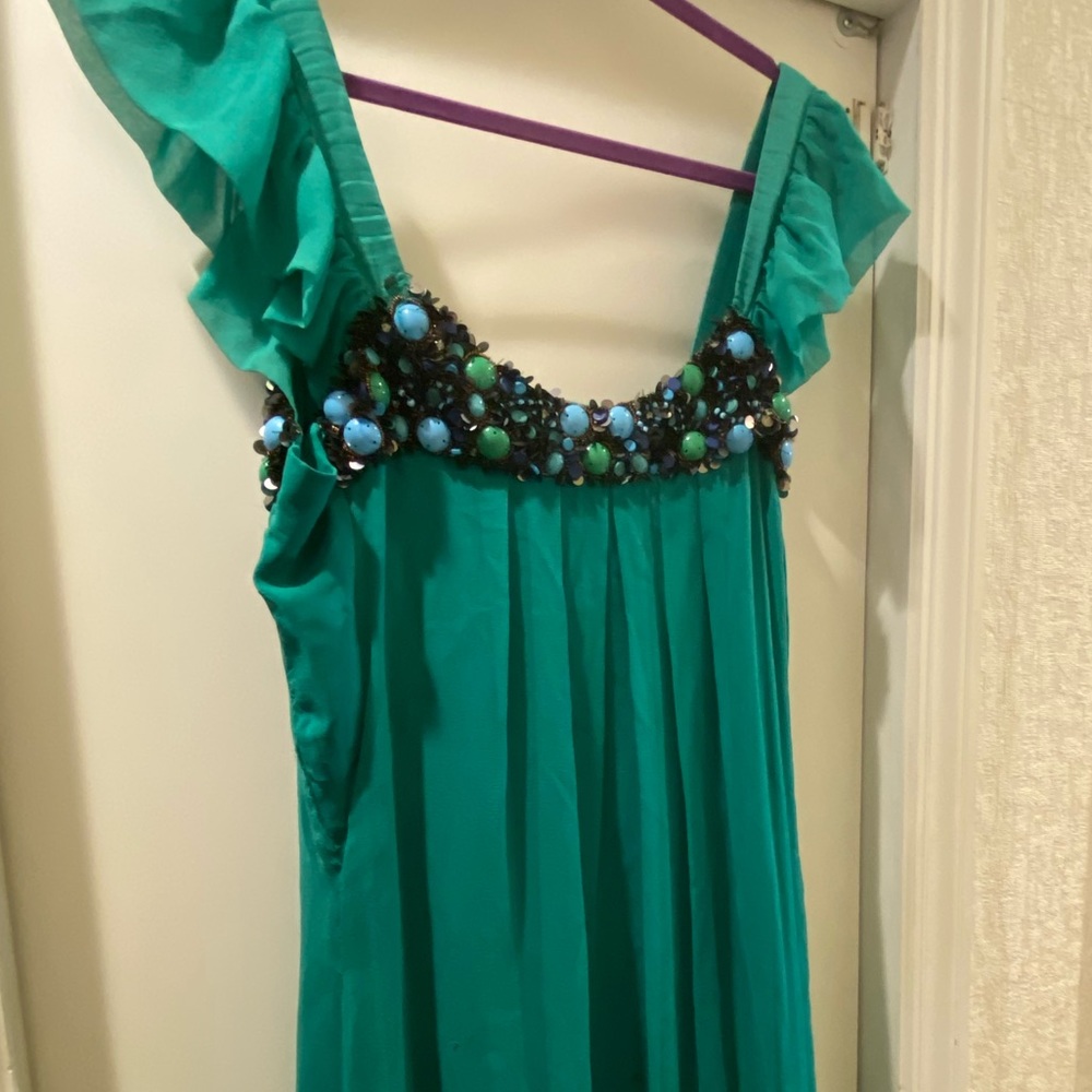 Evening dress , Green color with all around bits  large size